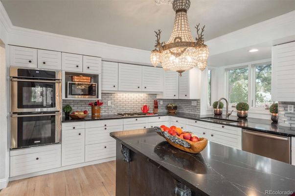 Chandelier, Interior, Kitchen, Recessed Lighting, Stainless Steel Appliances, Wood Texture Flooring