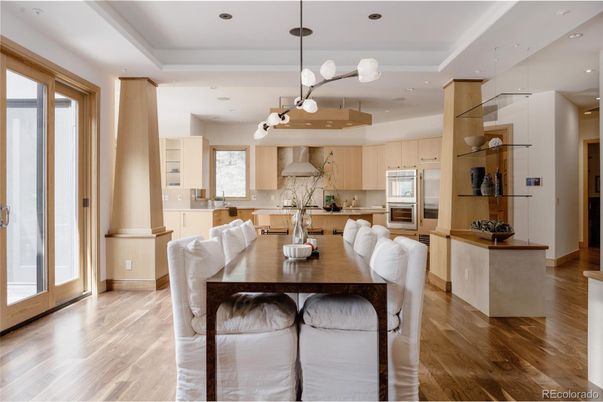 Dining room, Interior, Kitchen, Pendant Lights, Recessed Lighting, Stainless Steel Appliances, Wood Texture Flooring