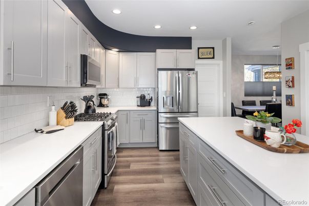 Dining room, Interior, Kitchen, Recessed Lighting, Stainless Steel Appliances, Wood Texture Flooring