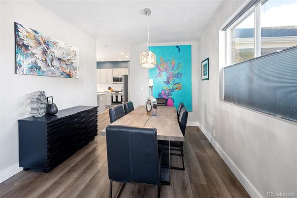 Dining room, Interior, Kitchen, Pendant Lights, Recessed Lighting, Stainless Steel Appliances, Wood Texture Flooring