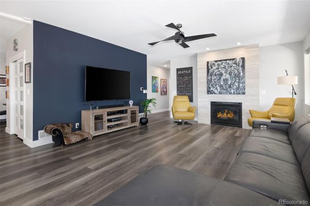 Fireplace, Interior, Living room, Recessed Lighting, Wood Texture Flooring