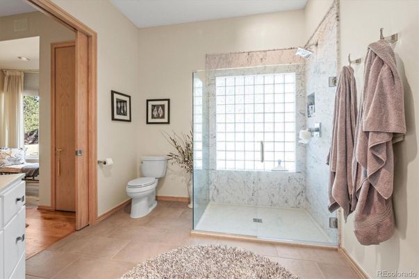Bathroom, Glass Shower, Interior, Marble Walls, Wood Texture Flooring