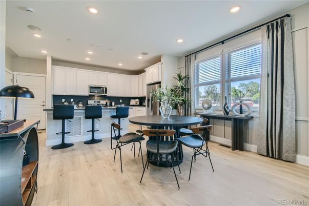 Dining room, Interior, Kitchen, Recessed Lighting, Stainless Steel Appliances, Wood Texture Flooring