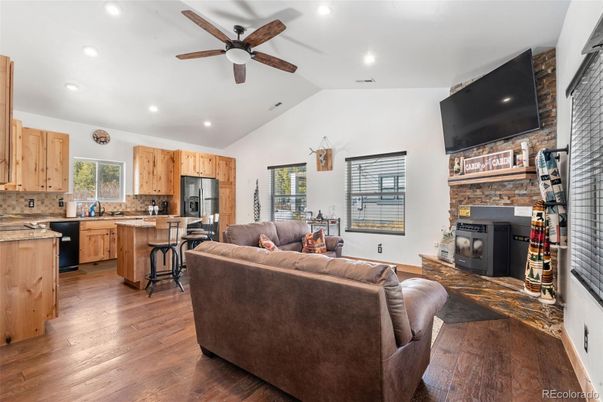 Fireplace, Interior, Kitchen, Living room, Recessed Lighting, Stone Walls, Wood Texture Flooring