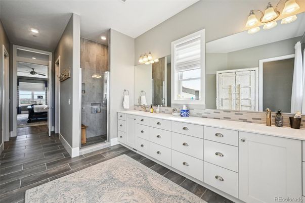 Bathroom, Dual Sink Vanities, Interior, Recessed Lighting, Wood Texture Flooring