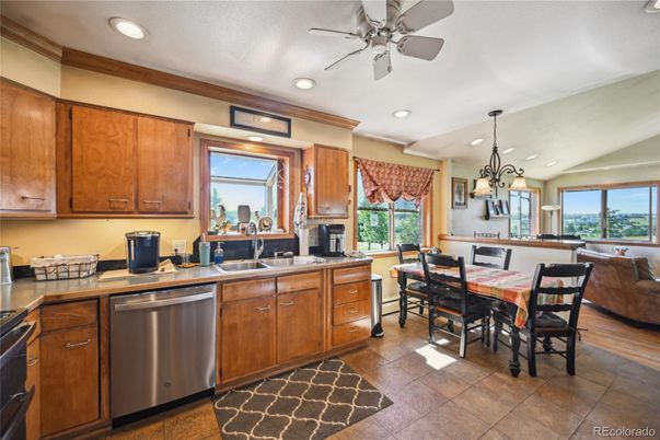 Chandelier, Dining room, Interior, Kitchen, Recessed Lighting, Stainless Steel Appliances