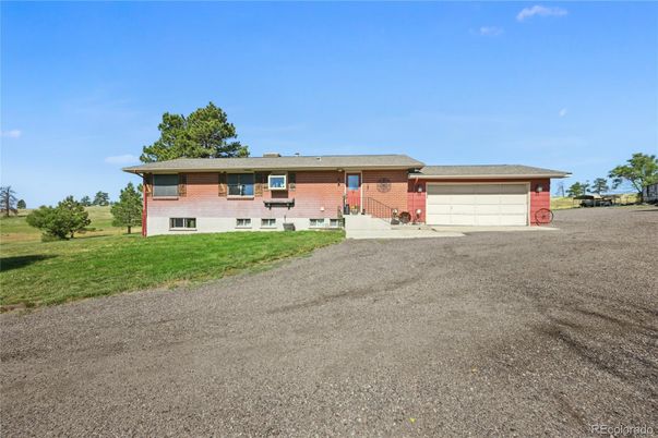 Attached, Backyard, Exterior, Facade, Brick Facade, Split Level