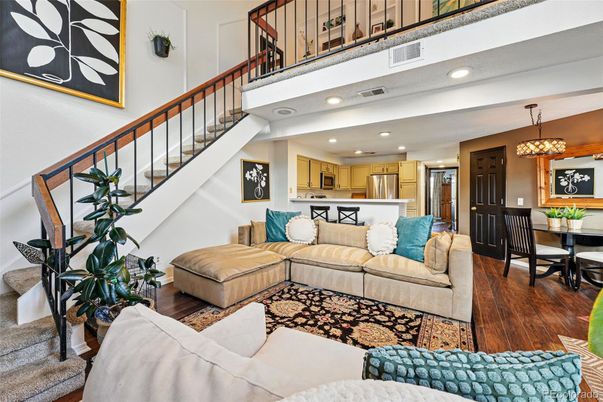 Chandelier, Dining room, Interior, Kitchen, Living room, Recessed Lighting, Stainless Steel Appliances, Wood Texture Flooring