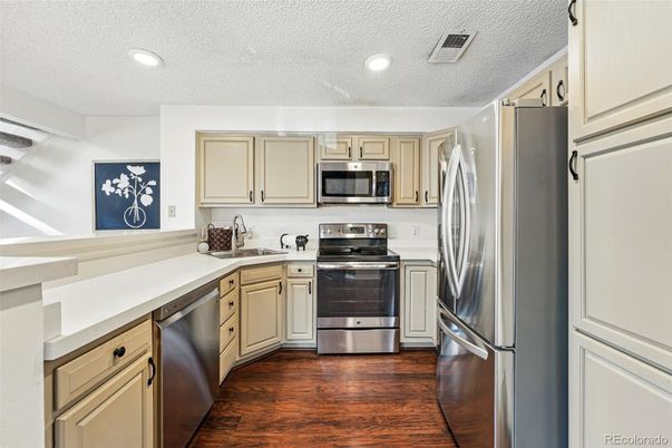 Interior, Kitchen, Recessed Lighting, Stainless Steel Appliances, Wood Texture Flooring
