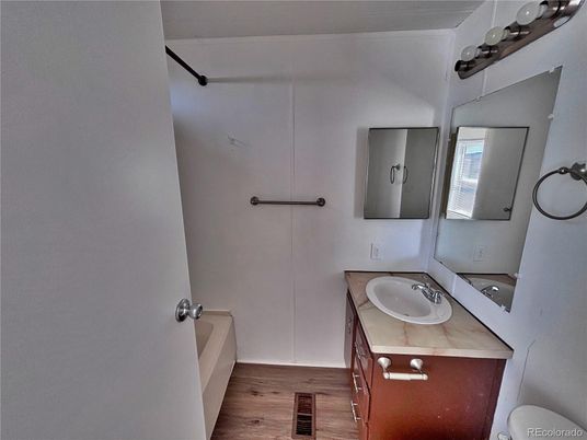 Bathroom, Dual Sink Vanities, Interior, Tile Countertops, Wood Texture Flooring