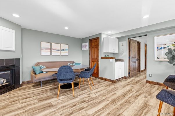 Dining room, Fireplace, Interior, Recessed Lighting, Wood Texture Flooring