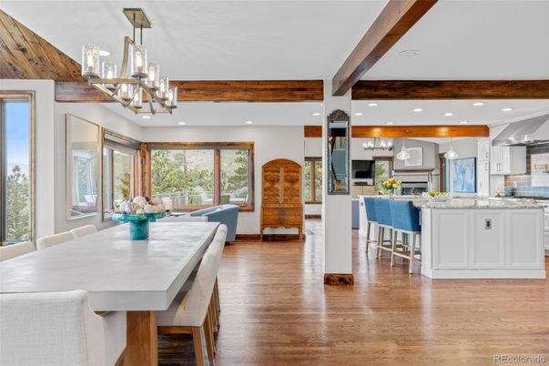 Chandelier, Dining room, Interior, Kitchen, Pendant Lights, Recessed Lighting, Stainless Steel Appliances, Wooden Beams, Wood Texture Flooring