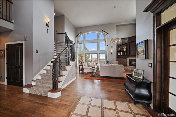 Chandelier, Fireplace, Interior, Living room, Recessed Lighting, Wood Texture Flooring