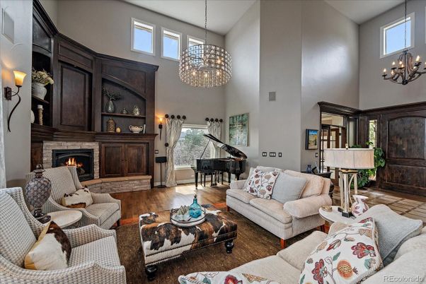 Chandelier, Fireplace, Interior, Living room, Piano, Wood Texture Flooring