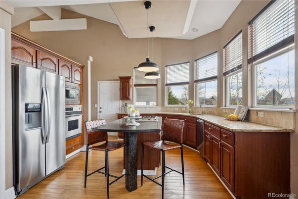 Dining room, Interior, Kitchen, Pendant Lights, Stainless Steel Appliances, Wood Texture Flooring