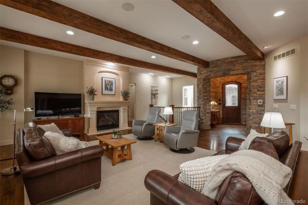 Fireplace, Interior, Living room, Recessed Lighting, Stone Walls, Wooden Beams, Wood Texture Flooring