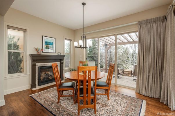 Dining room, Fireplace, Interior, Pendant Lights, Wood Texture Flooring