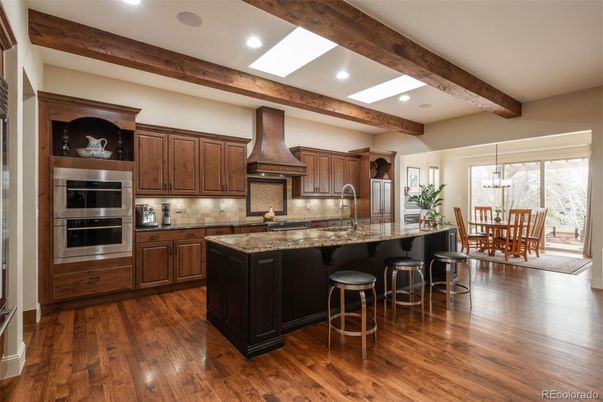 Dining room, Interior, Kitchen, Pendant Lights, Recessed Lighting, Stainless Steel Appliances, Wooden Beams, Wood Texture Flooring
