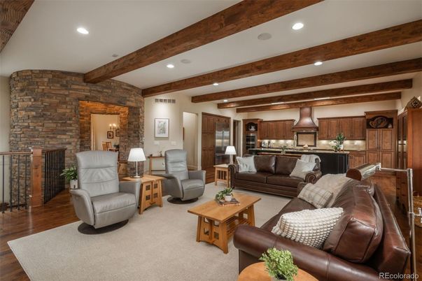 Interior, Kitchen, Living room, Recessed Lighting, Stainless Steel Appliances, Stone Walls, Wooden Beams, Wood Texture Flooring