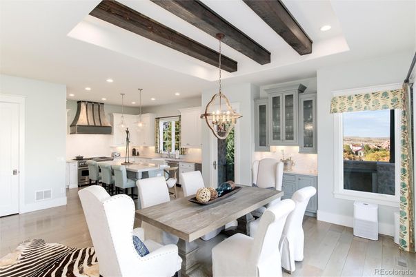 Chandelier, Dining room, Interior, Kitchen, Pendant Lights, Recessed Lighting, Stainless Steel Appliances, Wooden Beams, Wood Texture Flooring