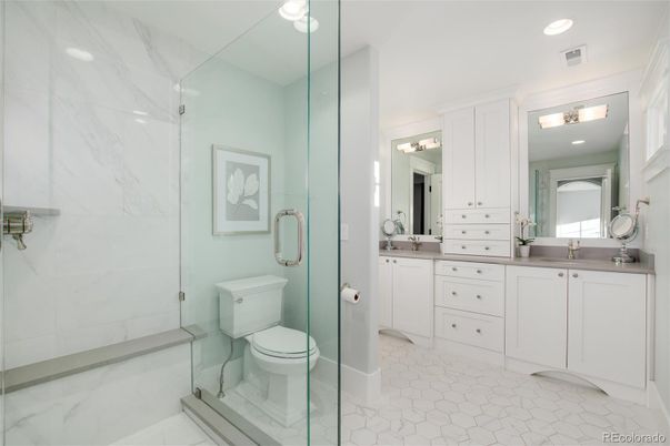 Bathroom, Dual Sink Vanities, Glass Shower, Interior, Marble Walls, Recessed Lighting