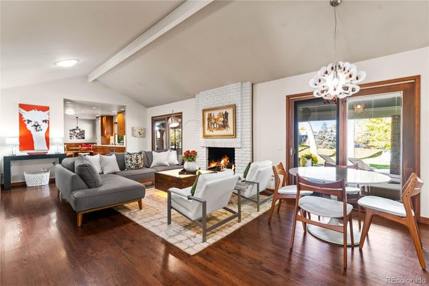 Dining room, Fireplace, Interior, Living room, Pendant Lights, Stone Walls, Wood Texture Flooring