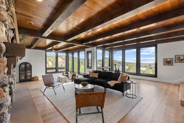 Fireplace, Interior, Living room, Recessed Lighting, Stone Walls, Wooden Beams, Wooden Ceilings, Wood Texture Flooring