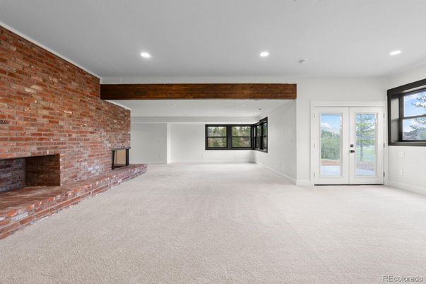 Empty room, Fireplace, Interior, Recessed Lighting, Stone Walls, Wooden Beams