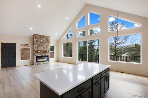 Fireplace, Interior, Pendant Lights, Recessed Lighting, Wood Texture Flooring