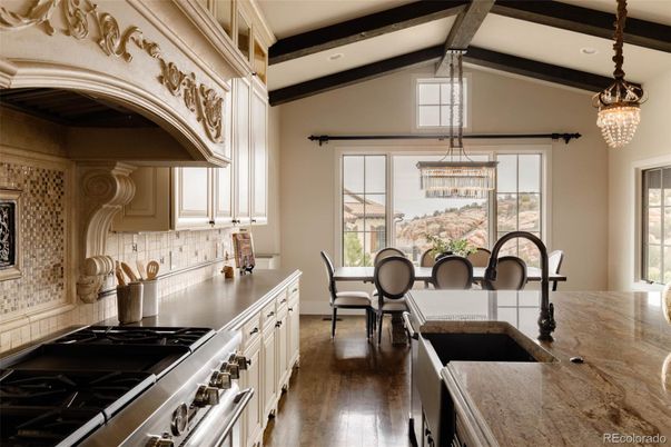 Chandelier, Dining room, Interior, Kitchen, Pendant Lights, Stainless Steel Appliances, Wooden Beams, Wood Texture Flooring