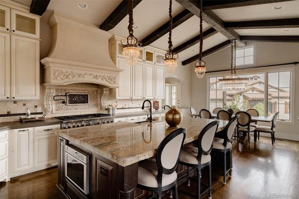Chandelier, Dining room, Interior, Kitchen, Pendant Lights, Recessed Lighting, Stainless Steel Appliances, Wooden Beams, Wood Texture Flooring