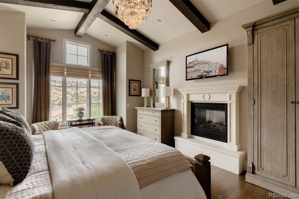Bedroom, Chandelier, Fireplace, Interior, Recessed Lighting, Wooden Beams, Wood Texture Flooring