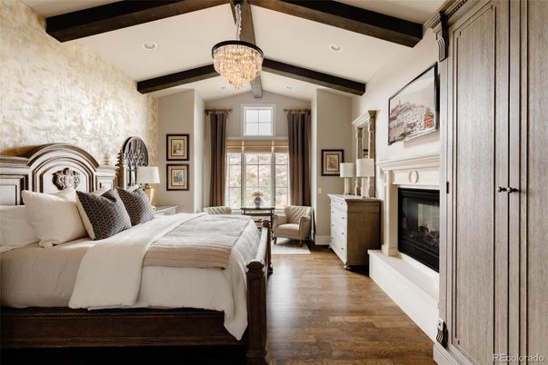 Bedroom, Chandelier, Fireplace, Interior, Recessed Lighting, Wooden Beams, Wood Texture Flooring