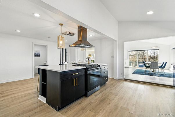 Dining room, Interior, Kitchen, Pendant Lights, Recessed Lighting, Stainless Steel Appliances, Wood Texture Flooring