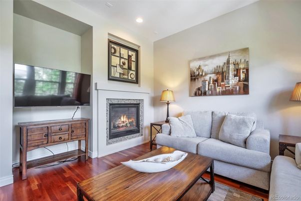 Fireplace, Interior, Living room, Recessed Lighting, Wood Texture Flooring