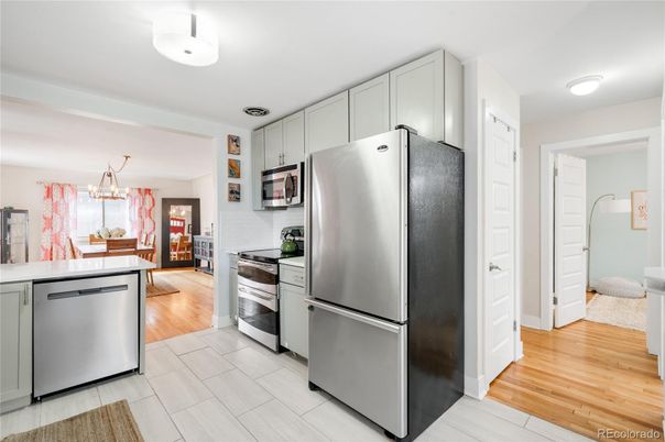 Dining room, Interior, Kitchen, Pendant Lights, Stainless Steel Appliances, Wood Texture Flooring