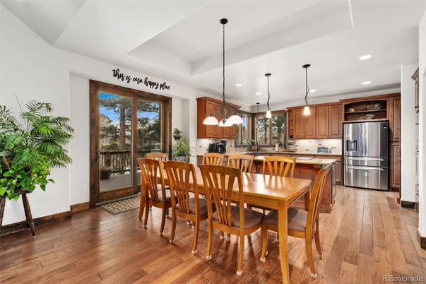 Dining room, Interior, Kitchen, Pendant Lights, Recessed Lighting, Stainless Steel Appliances, Wood Texture Flooring