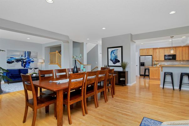 Dining room, Interior, Kitchen, Pendant Lights, Recessed Lighting, Stainless Steel Appliances, Wood Texture Flooring