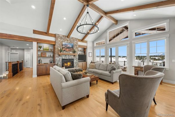 Fireplace, Interior, Living room, Recessed Lighting, Stone Walls, Wooden Beams, Wood Texture Flooring