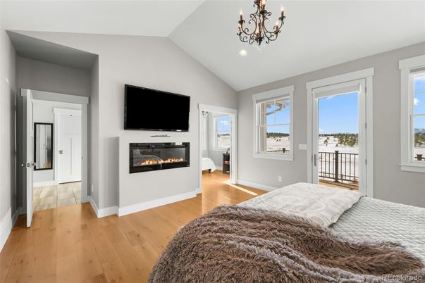 Bedroom, Chandelier, Fireplace, Interior, Wood Texture Flooring