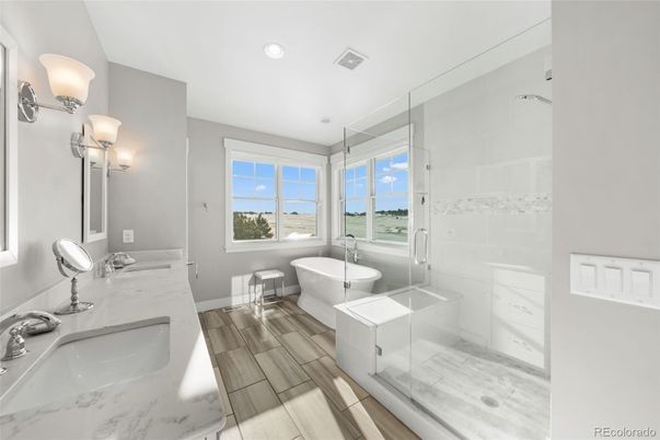 Bathroom, Dual Sink Vanities, Free Standing Baths, Glass Shower, Interior, Recessed Lighting, Wood Texture Flooring
