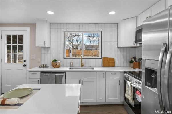 Interior, Kitchen, Recessed Lighting, Stainless Steel Appliances, Wood Texture Flooring