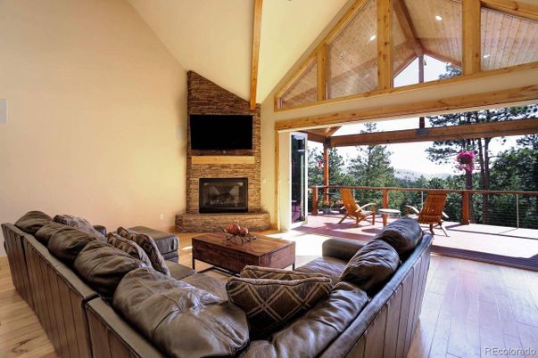 Fireplace, Interior, Living room, Recessed Lighting, Stone Walls, Wooden Beams, Wooden Ceilings, Wood Texture Flooring