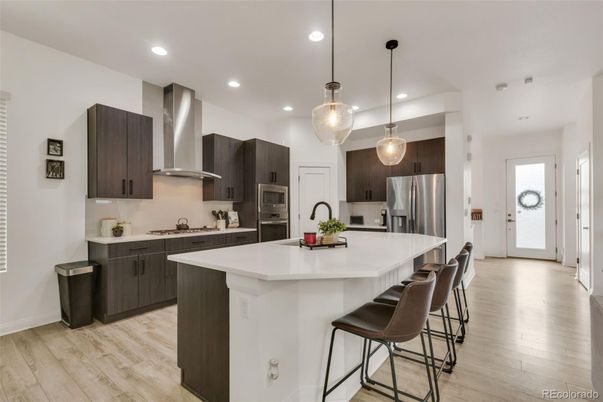 Interior, Kitchen, Pendant Lights, Recessed Lighting, Stainless Steel Appliances, Wood Texture Flooring