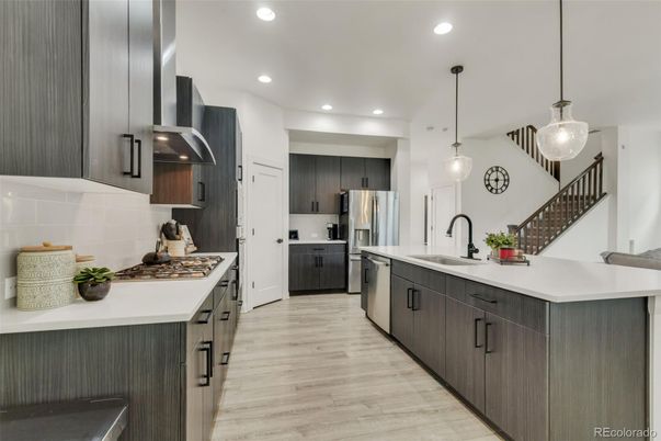 Interior, Kitchen, Pendant Lights, Recessed Lighting, Stainless Steel Appliances, Wood Texture Flooring