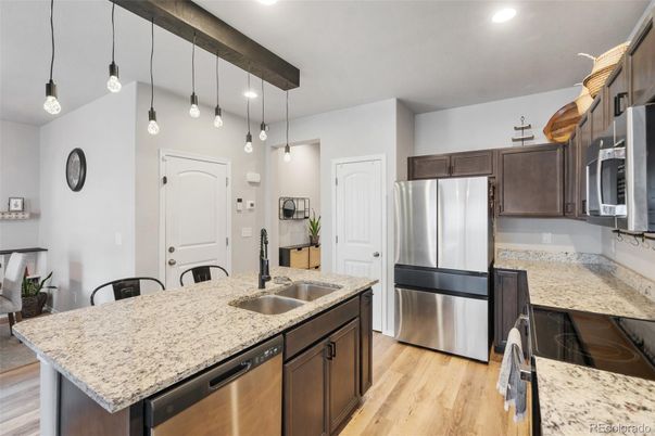 Interior, Kitchen, Pendant Lights, Recessed Lighting, Stainless Steel Appliances, Wood Texture Flooring