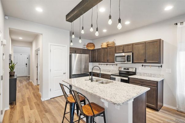 Interior, Kitchen, Pendant Lights, Recessed Lighting, Stainless Steel Appliances, Wood Texture Flooring