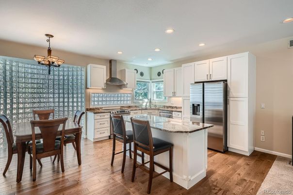 Chandelier, Dining room, Interior, Kitchen, Recessed Lighting, Stainless Steel Appliances, Wood Texture Flooring