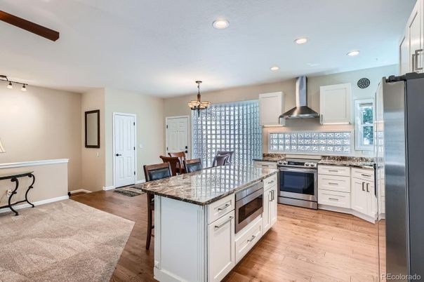 Chandelier, Interior, Kitchen, Recessed Lighting, Stainless Steel Appliances, Wood Texture Flooring