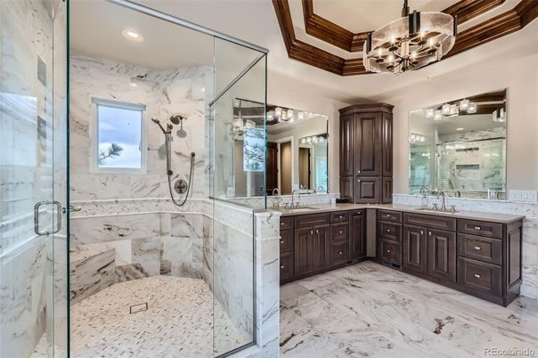 Bathroom, Dual Sink Vanities, Glass Shower, Interior, Marble, Marble Walls, Recessed Lighting